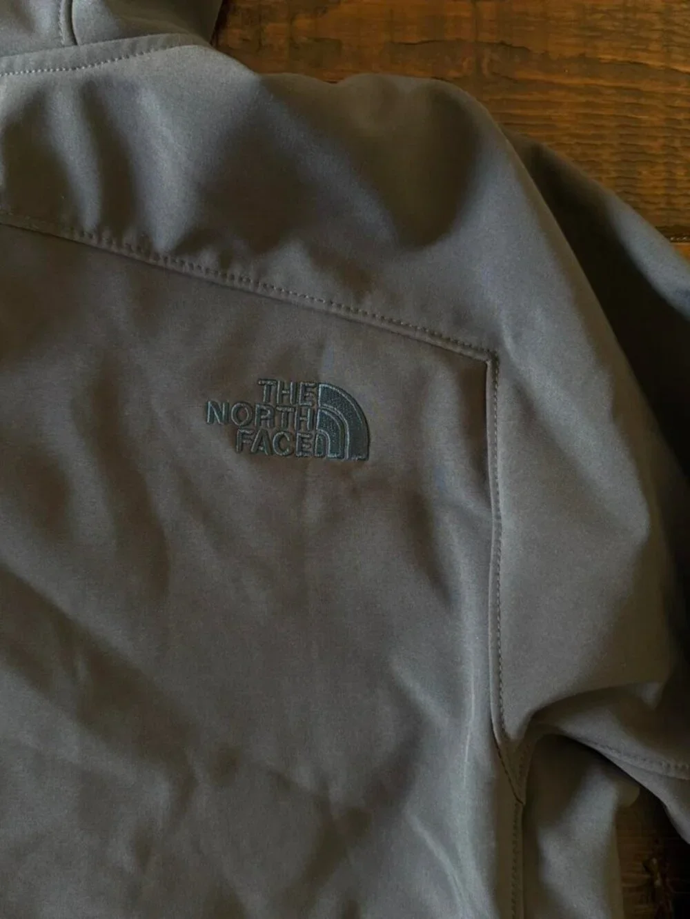 The North Face gray and blue softshell jacket   men’s medium